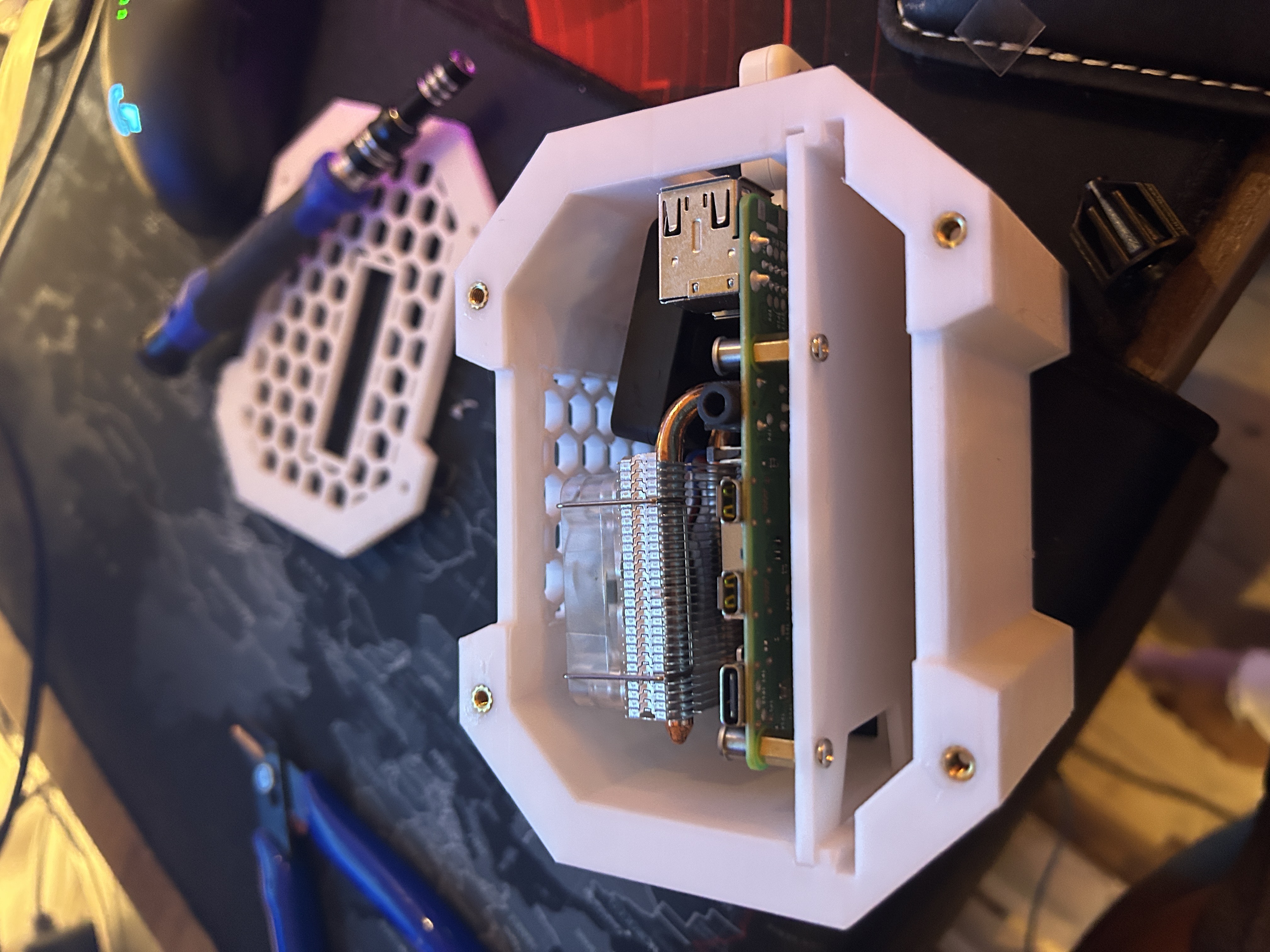 Side view of the Pi and cooler fitted into the 3D‑printed enclosure.