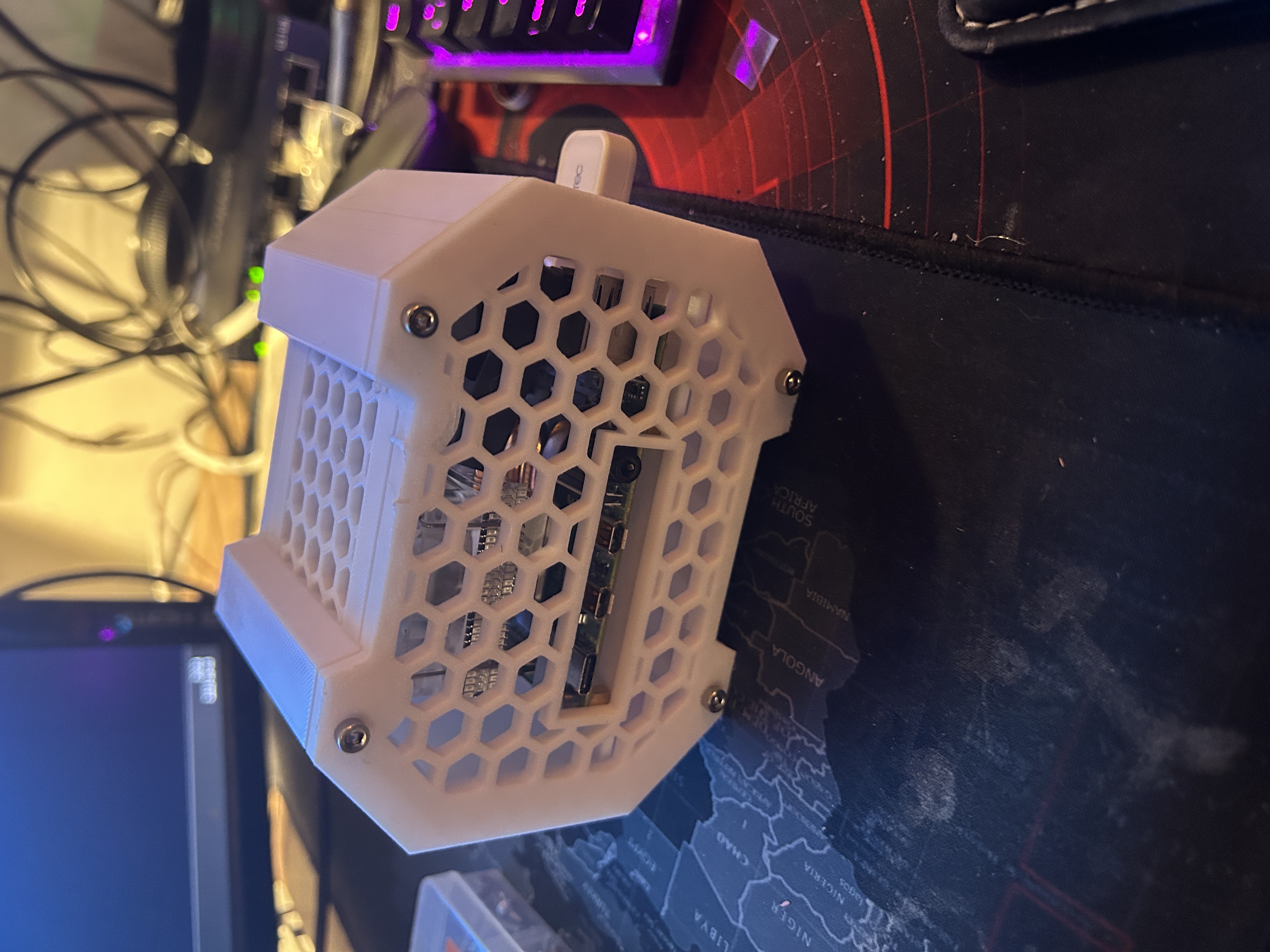 Front perspective of the Raspberry Pi case with hexagonal ventilation pattern.